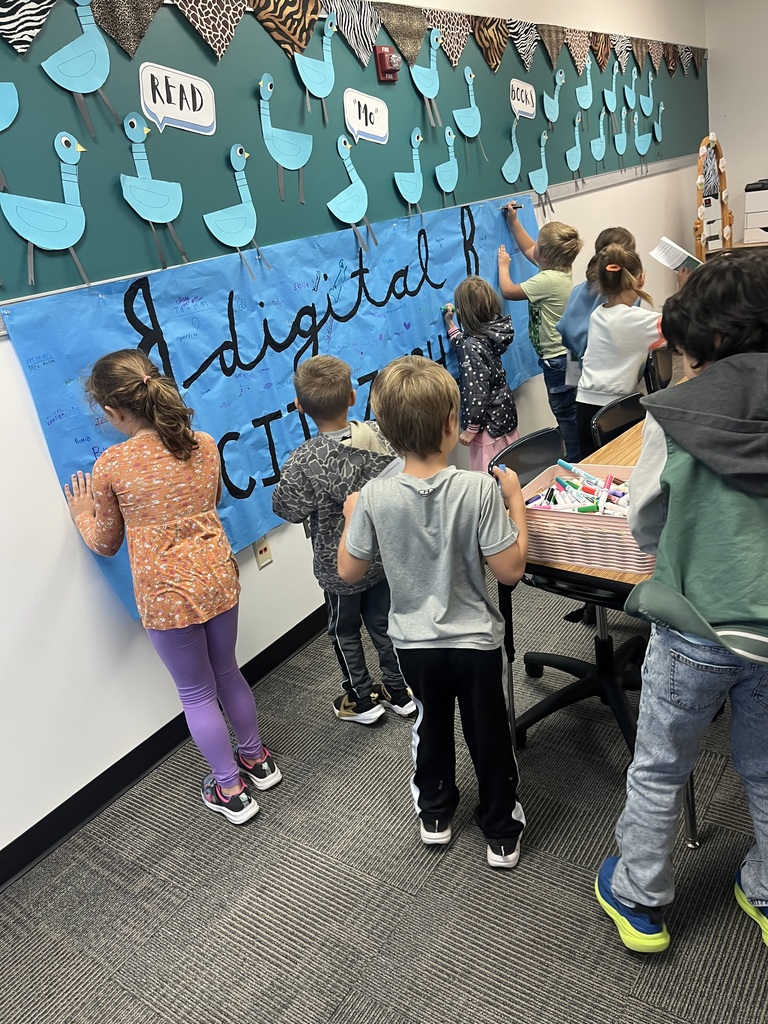 Children signing their names