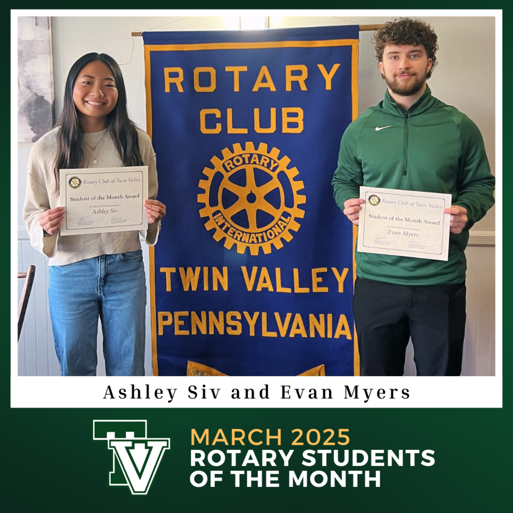 ashley siv and evan myers holding up rotary club certificates