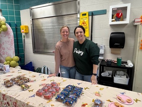 robeson pto members at snack table smiling
