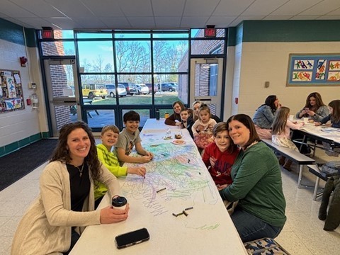 table of moms and students