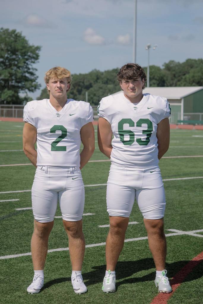 two boys in twin valley school district football uniforms