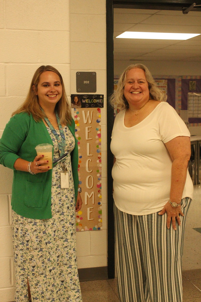 teachers posing and smiling