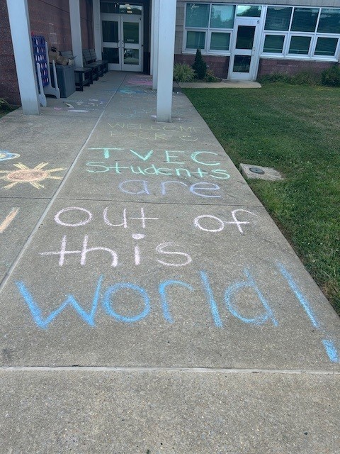 Chalk on sidewalk- TVEC students are out of this world