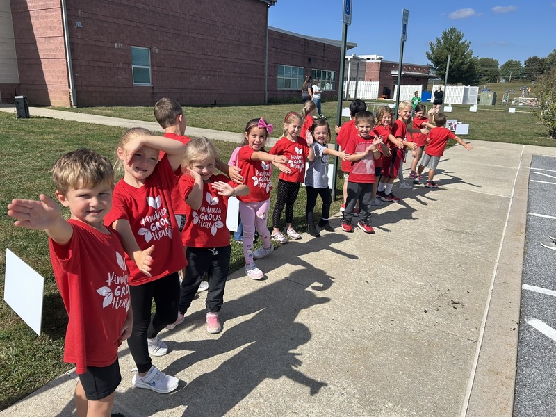 Kindergarten students cheering