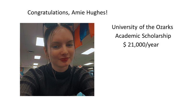 Amie Hughes receiving a $21,000.00 academic scholarship from the University of the Ozarks