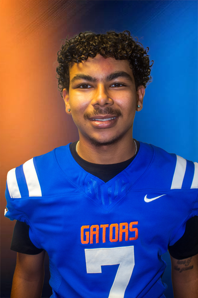 Maliki Thompson, number 7, is her escort. He is a senior and the son of Garry and Rhonda Thompson. Maliki is active in football. He enjoys riding, fishing, hunting, and just having fun.