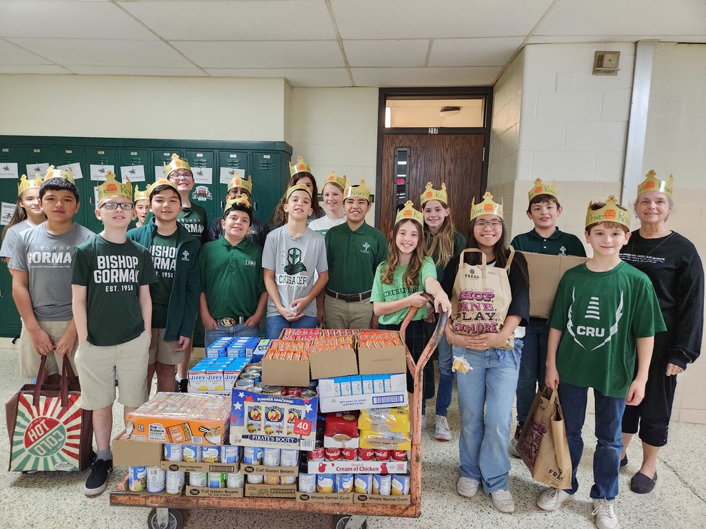 Sixth grade students  collecting food for the ETFB.