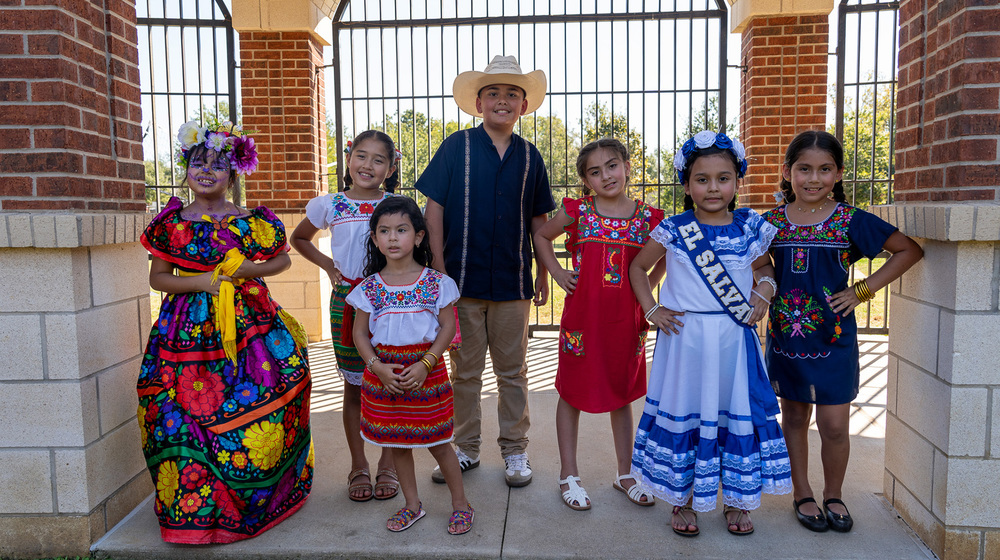 elementary age kids dressed in traditional Hispanic attire