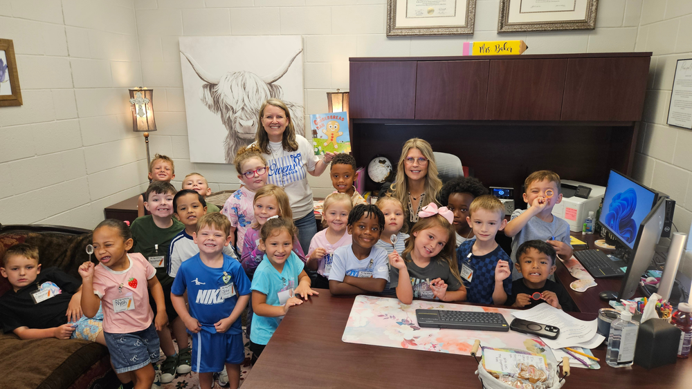 Mrs. Lockhart's kindergarten class with the principal, Brandy Baker.