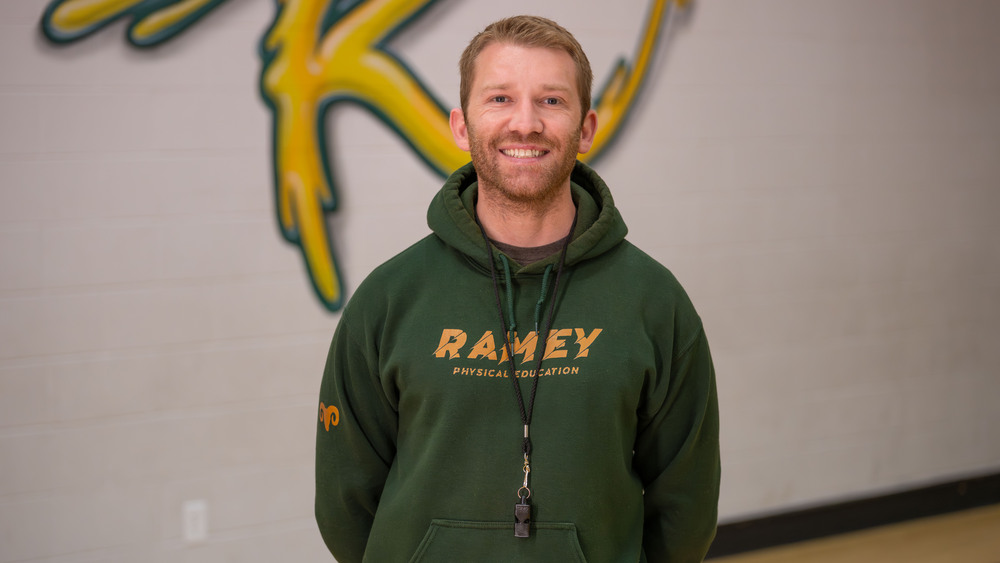 man with beard wearing Ramey Elementary School hoodie