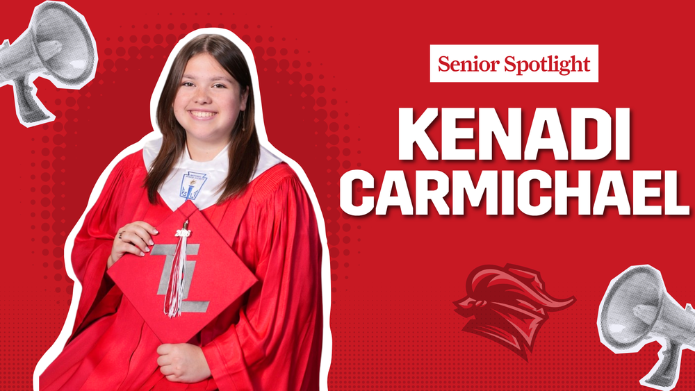 teen girl in red graduation gown hold cap. Senior Spotlight Kenadi Carmichael