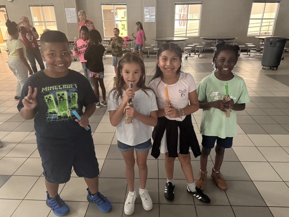 students eatign popsicles at a dance party