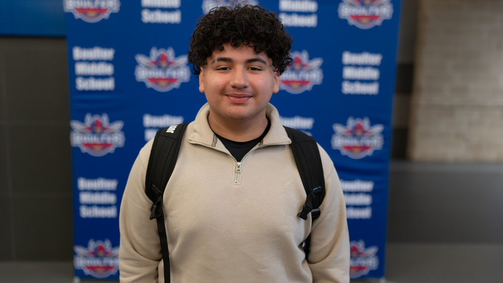 teen male smiling at camera