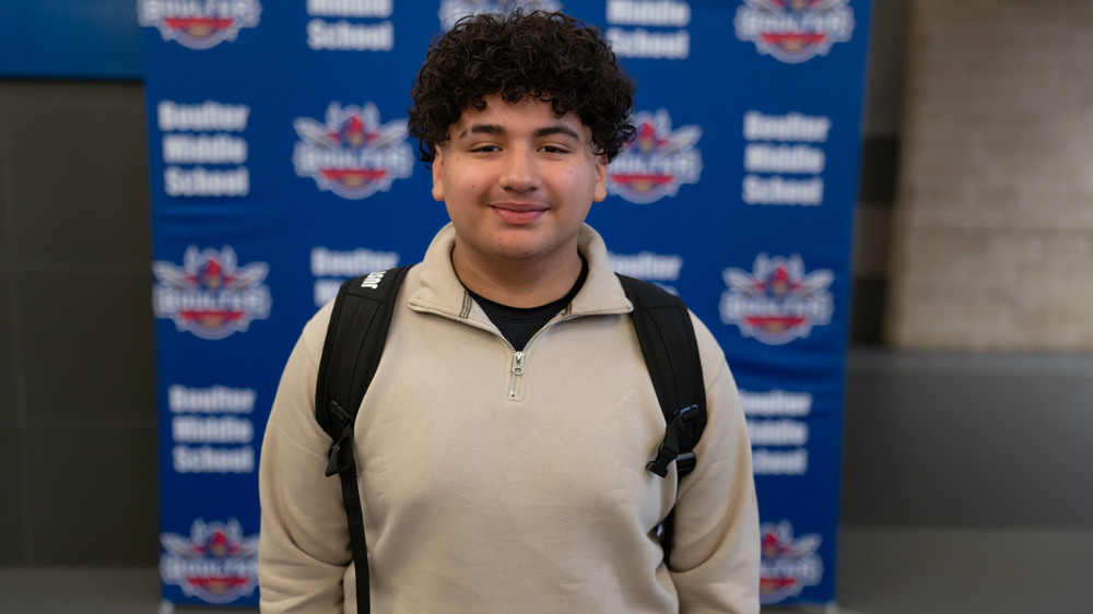 teen male smiling at camera