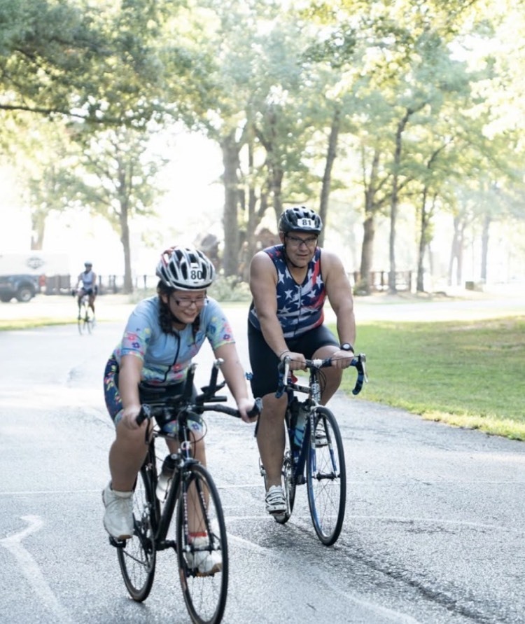 dad and daughter on bikes