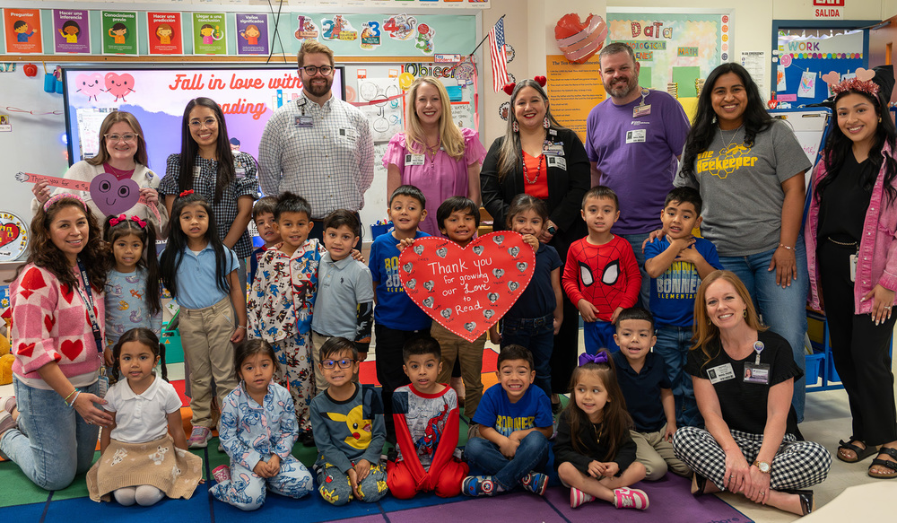 pre-K kids and adults in a classroom