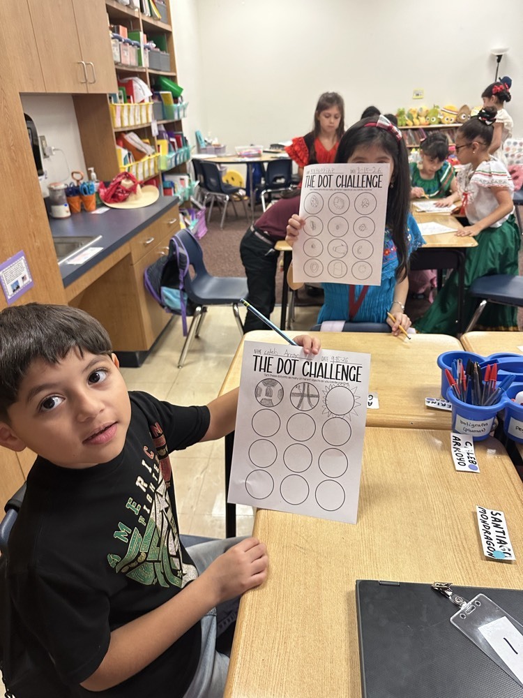 boy showing picture