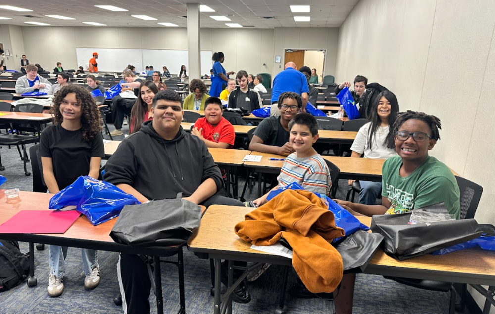teens sitting at desks