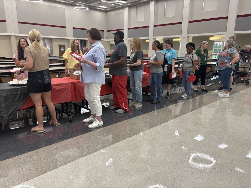 Tyler Legacy staff getting breakfast from PTA