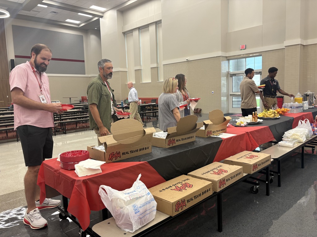Tyler Legacy staff getting breakfast from PTA