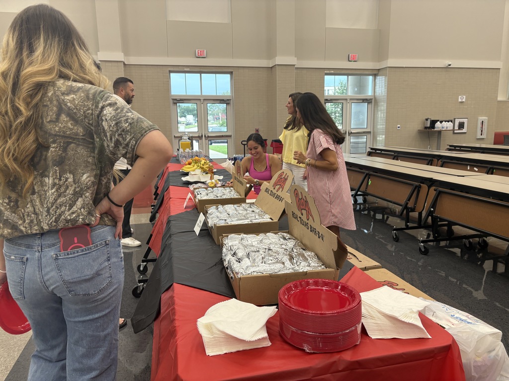 Tyler Legacy staff getting breakfast from PTA