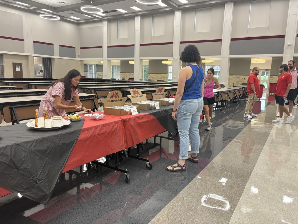 Tyler Legacy staff getting breakfast from PTA