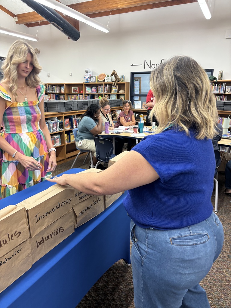 Teachers during a training doing an ice breaker