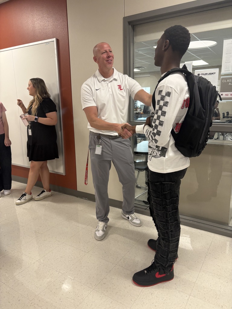 Tyler Legacy staff greeting students on the first day of school