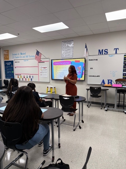 teacher presenting to students