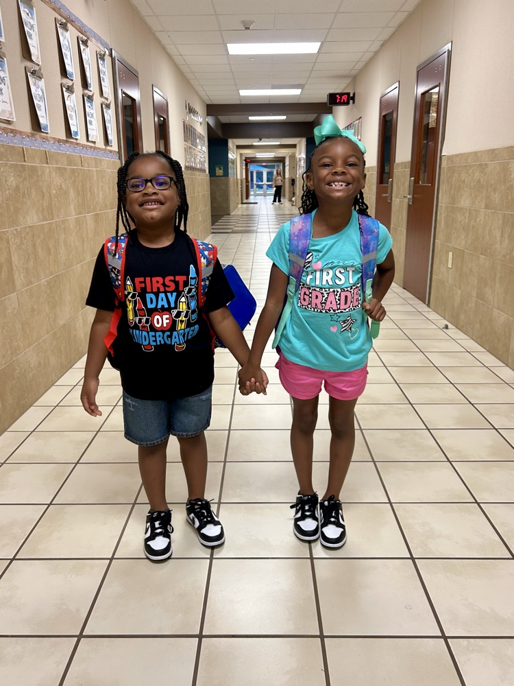 students holding hands