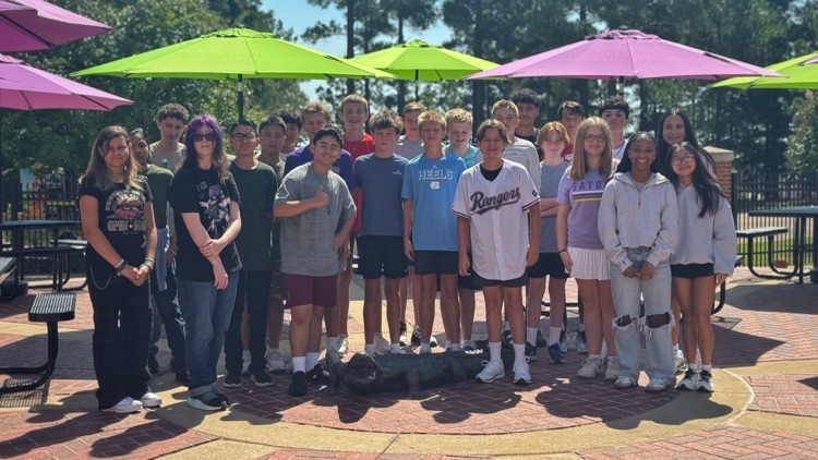 Students standing in the courtyard.