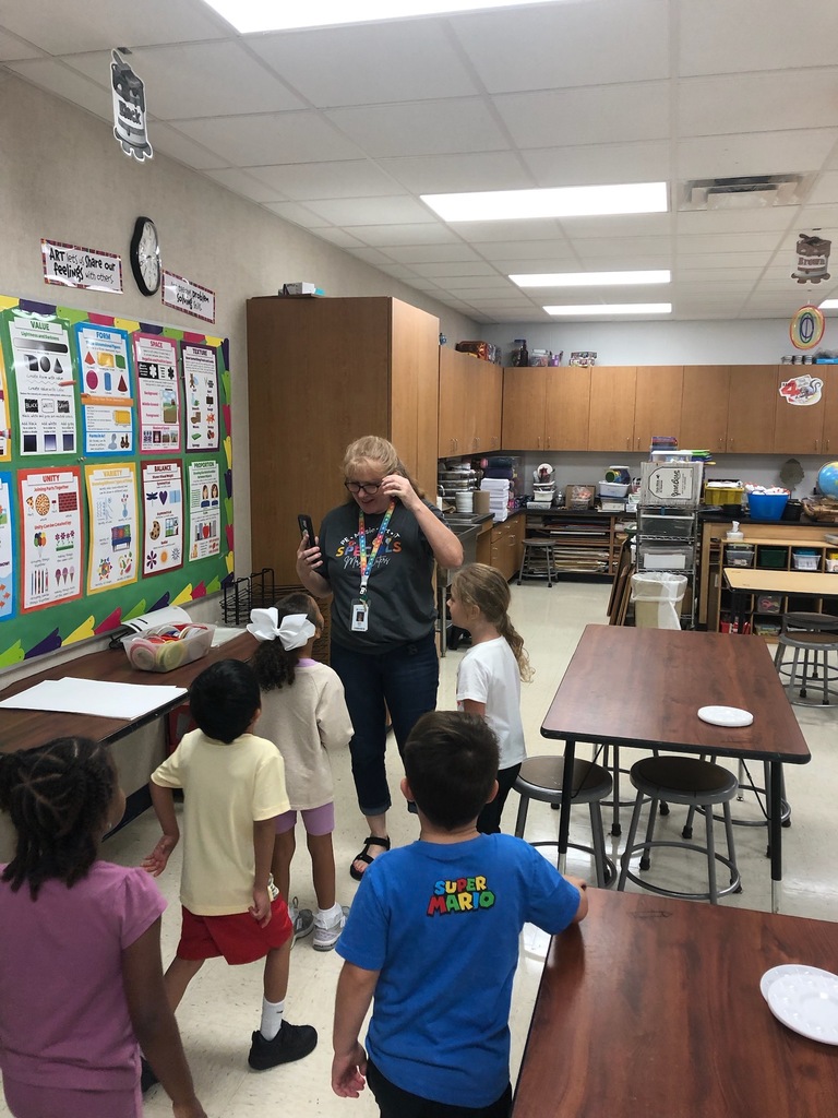 Students asking the art teacher, where the gingerbread man is.