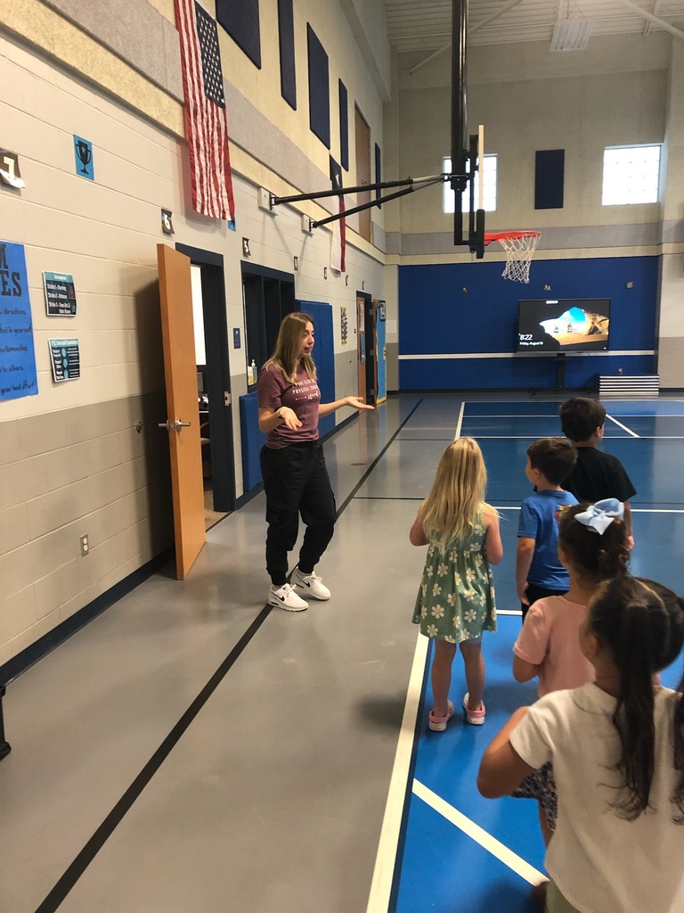Students asking the coach if she's seen the gingerbread man.