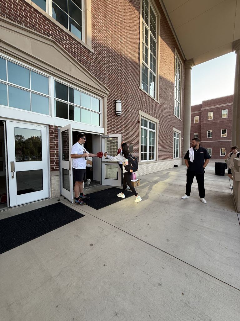 Tyler Legacy Watch dog dads greeting students