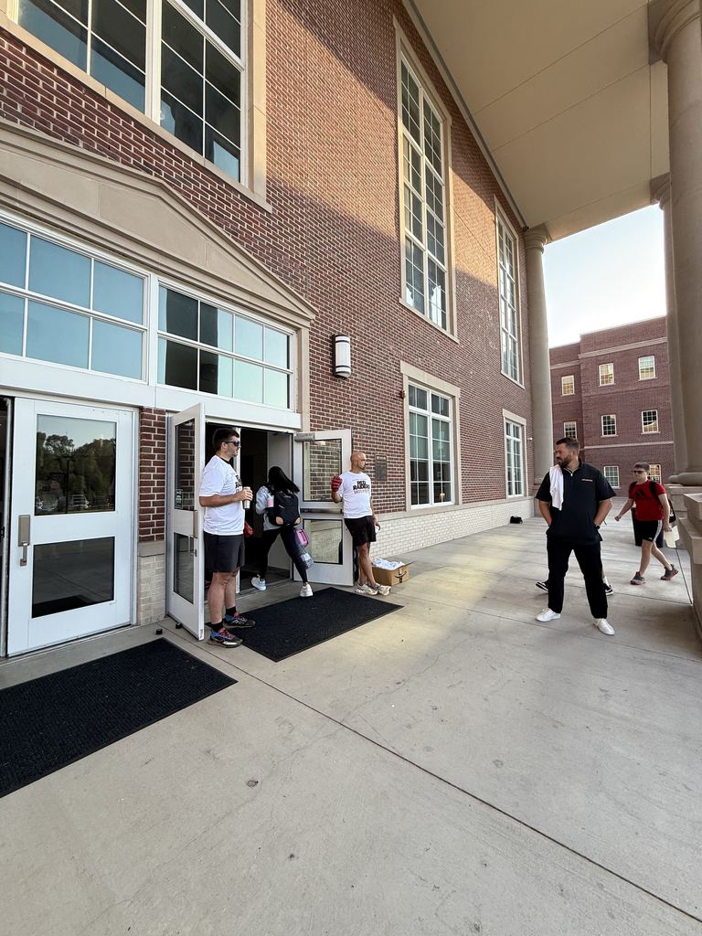 Tyler Legacy Watch dog dads greeting students