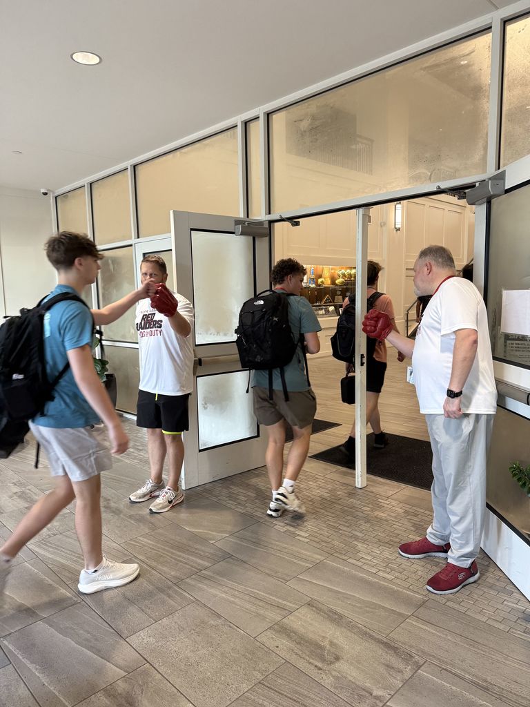 Tyler Legacy Watch dog dads greeting students