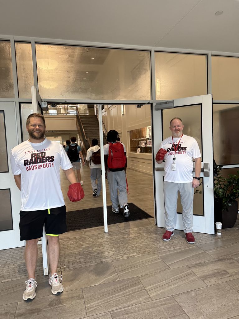 Tyler Legacy Watch dog dads greeting students