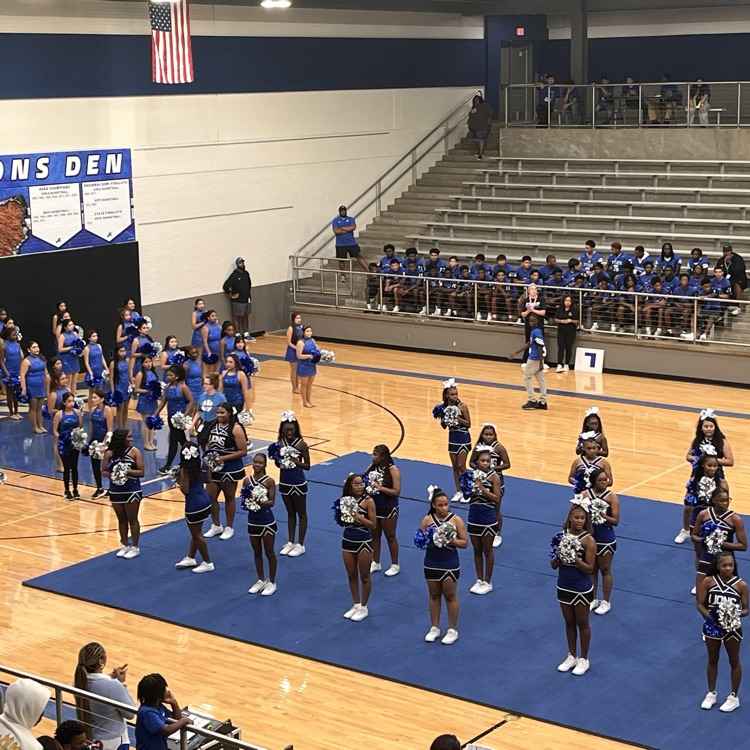 drill team and cheerleaders on court