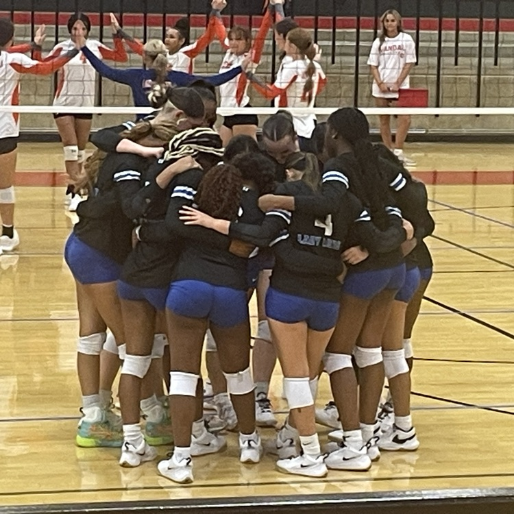 players on volleyball court