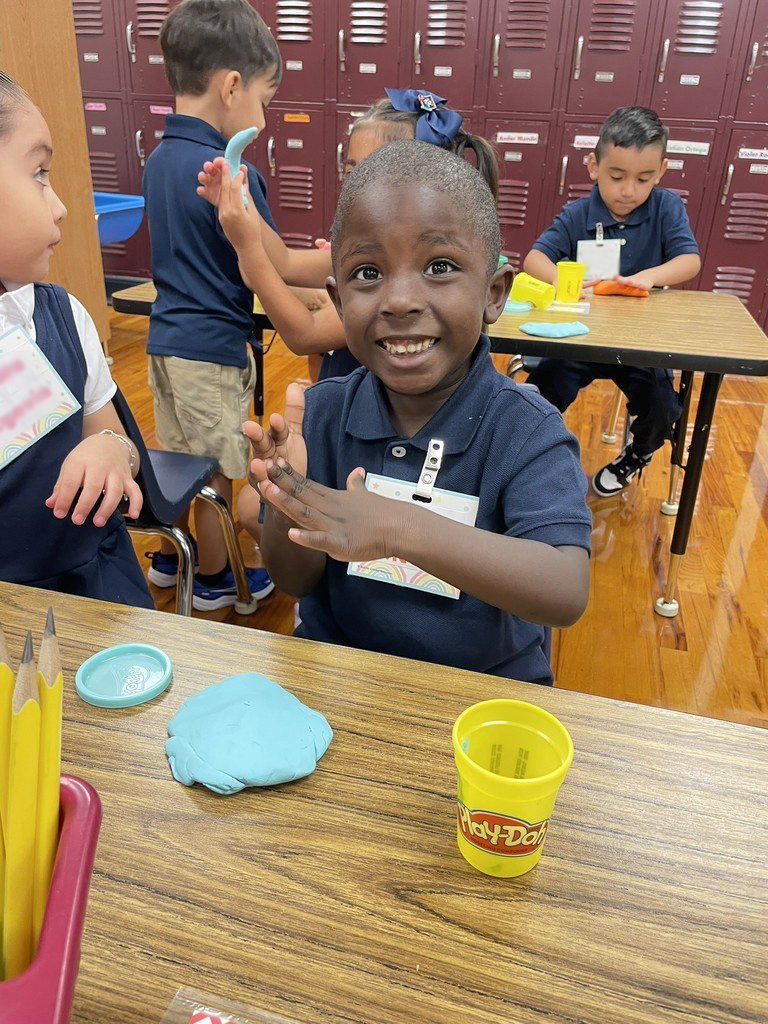 Birdwell students with playdoh