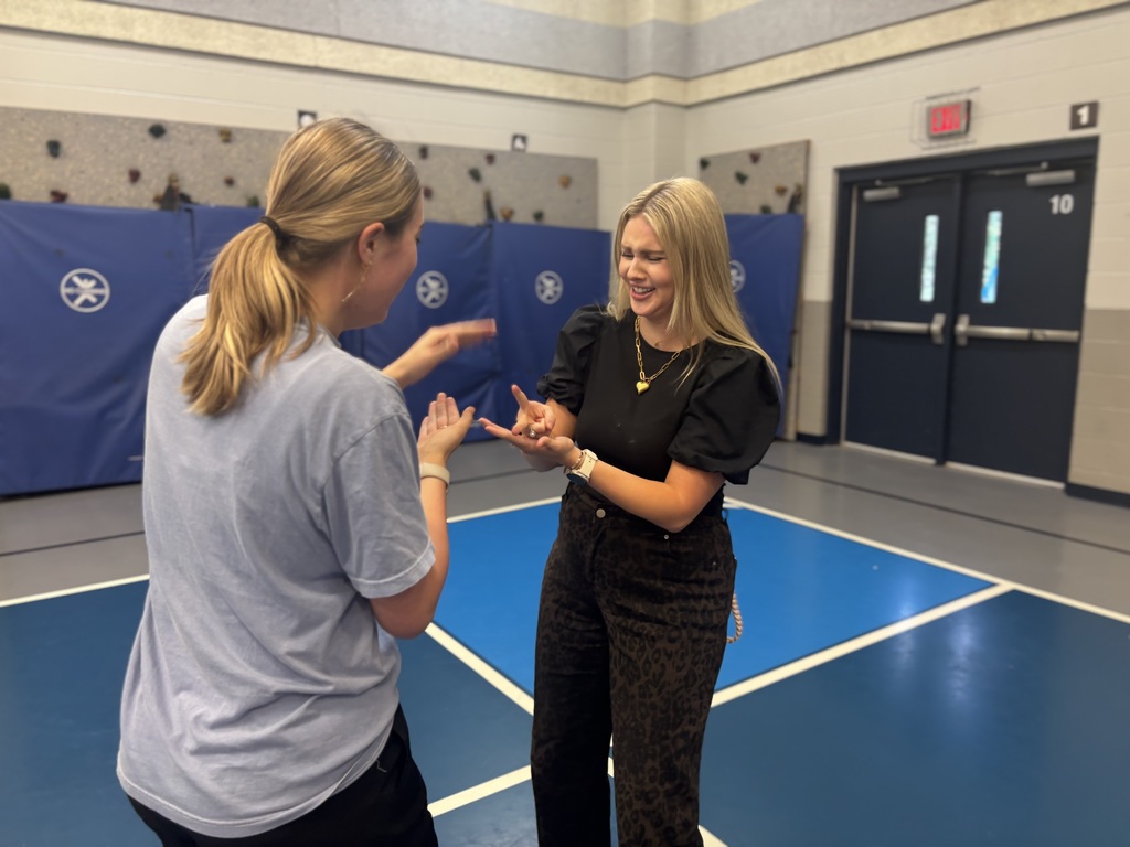 Staff playing Rock, Paper, Scissors