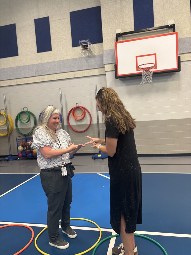 Staff playing Rock, Paper, Scissors
