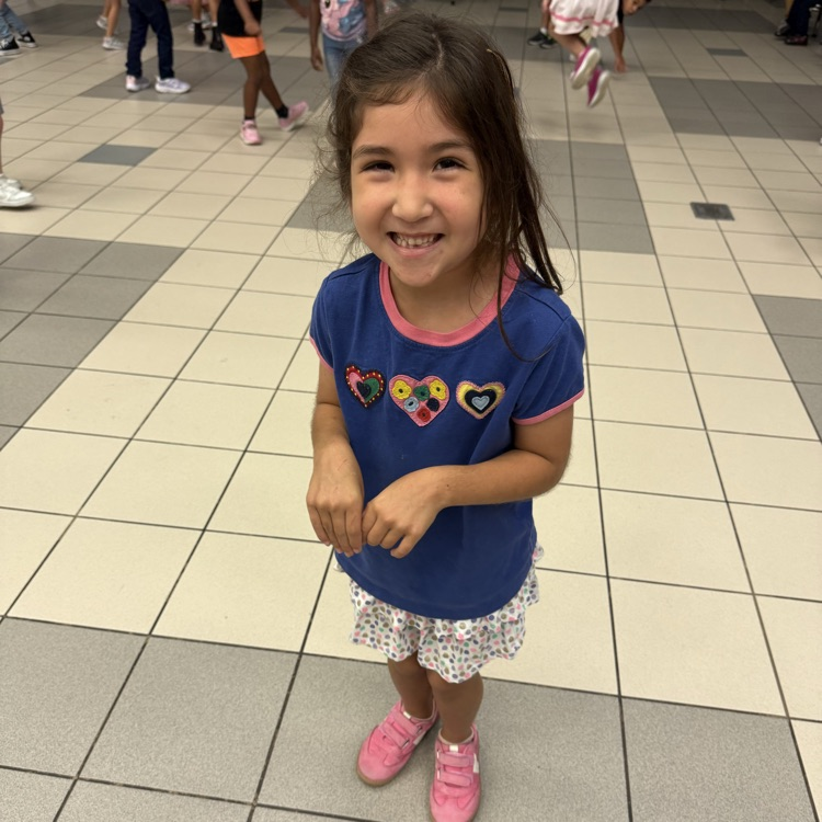 Student smiling at behavior party