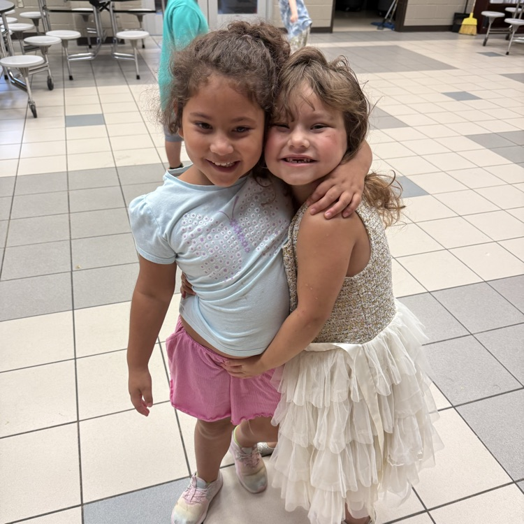 Sisters hugging at behavior party