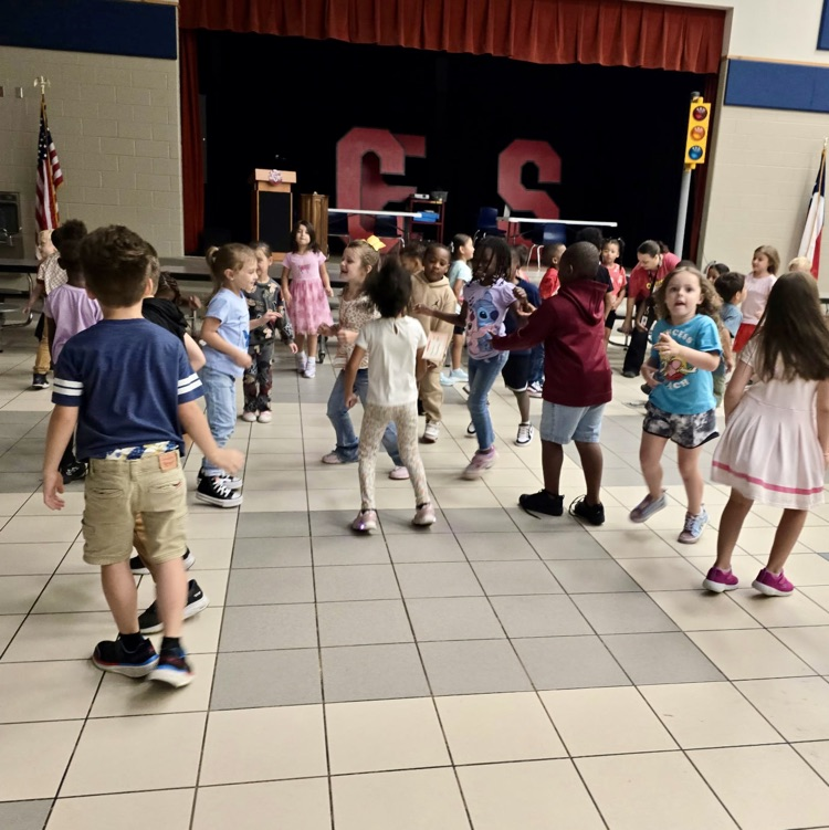 Students dancing at At The behavior party