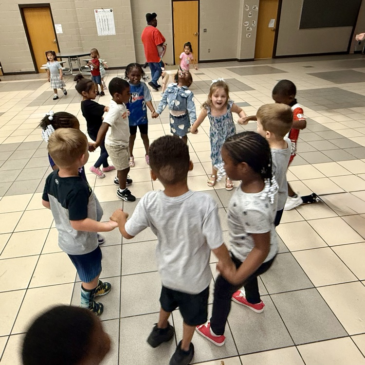 Students dancing at the behavior party