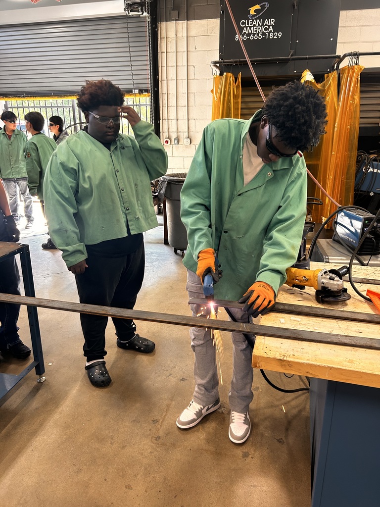 students welding