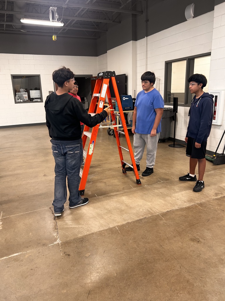 students learning how to climb ladder properly