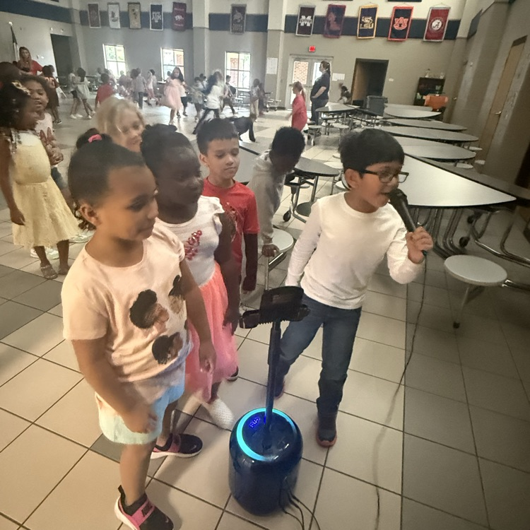 student singing karaoke at a dance party