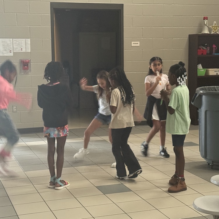 Students dancing at a dance party